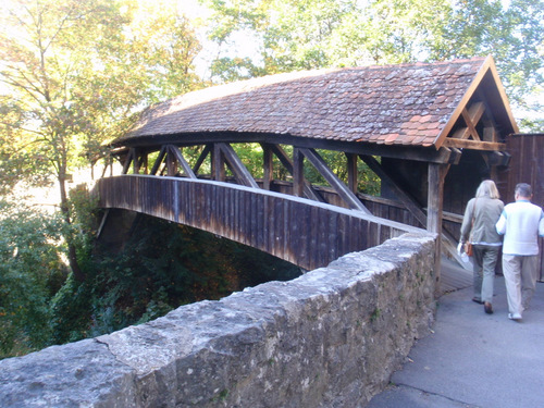 Covered bridge over a castle feeder creek.
